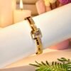 The Solitaire Crown Bangle